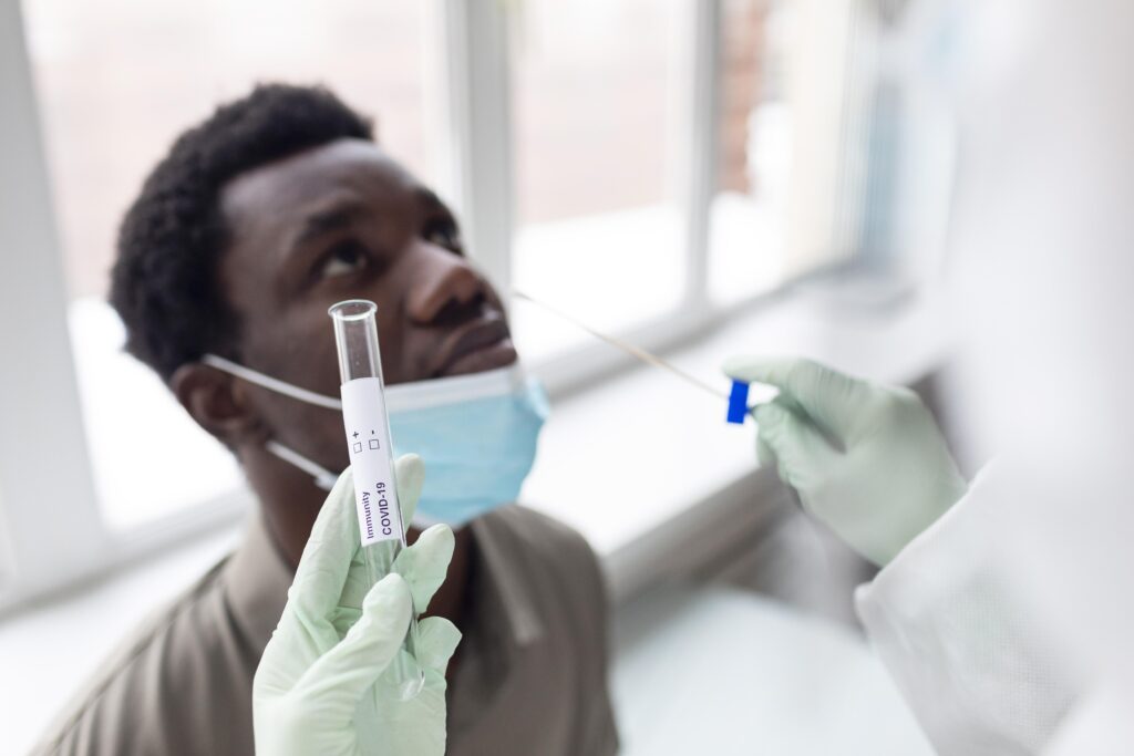 Doctor taking coronavirus test sample